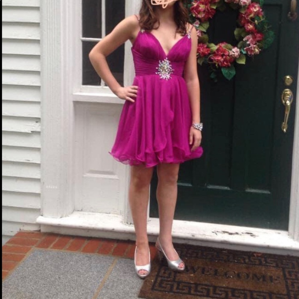 Semi formal dress by Mac Duggal. Gems on straps. All gems are sewn, not glued.